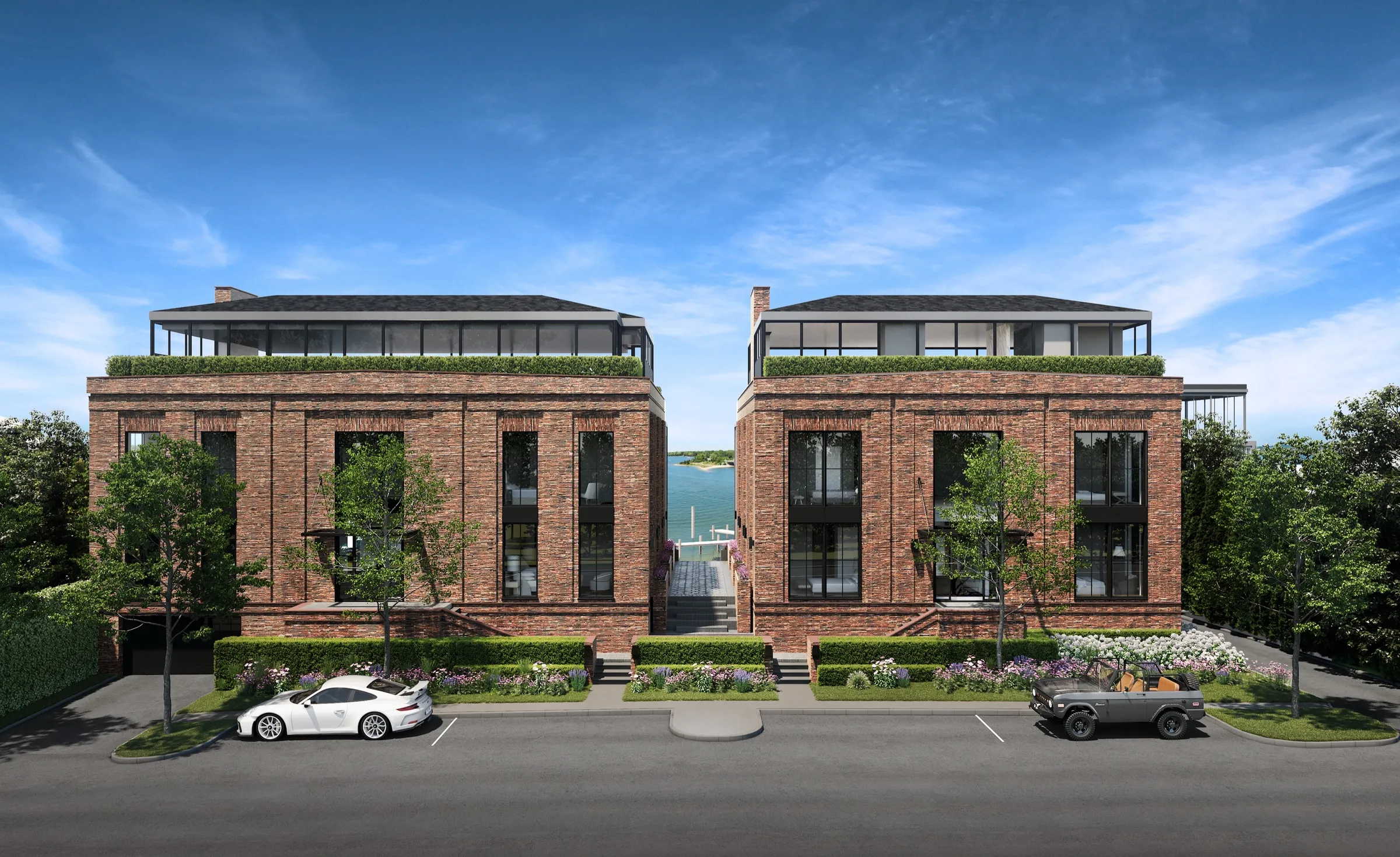 3D rendering of the street front of 2 West Water Street in Sag Harbor, designed by Andre Kikoski Architect for J.Bialsky: two red-brick buildings with tall black-framed windows and glass rooftop pavilions, the cove visible between them