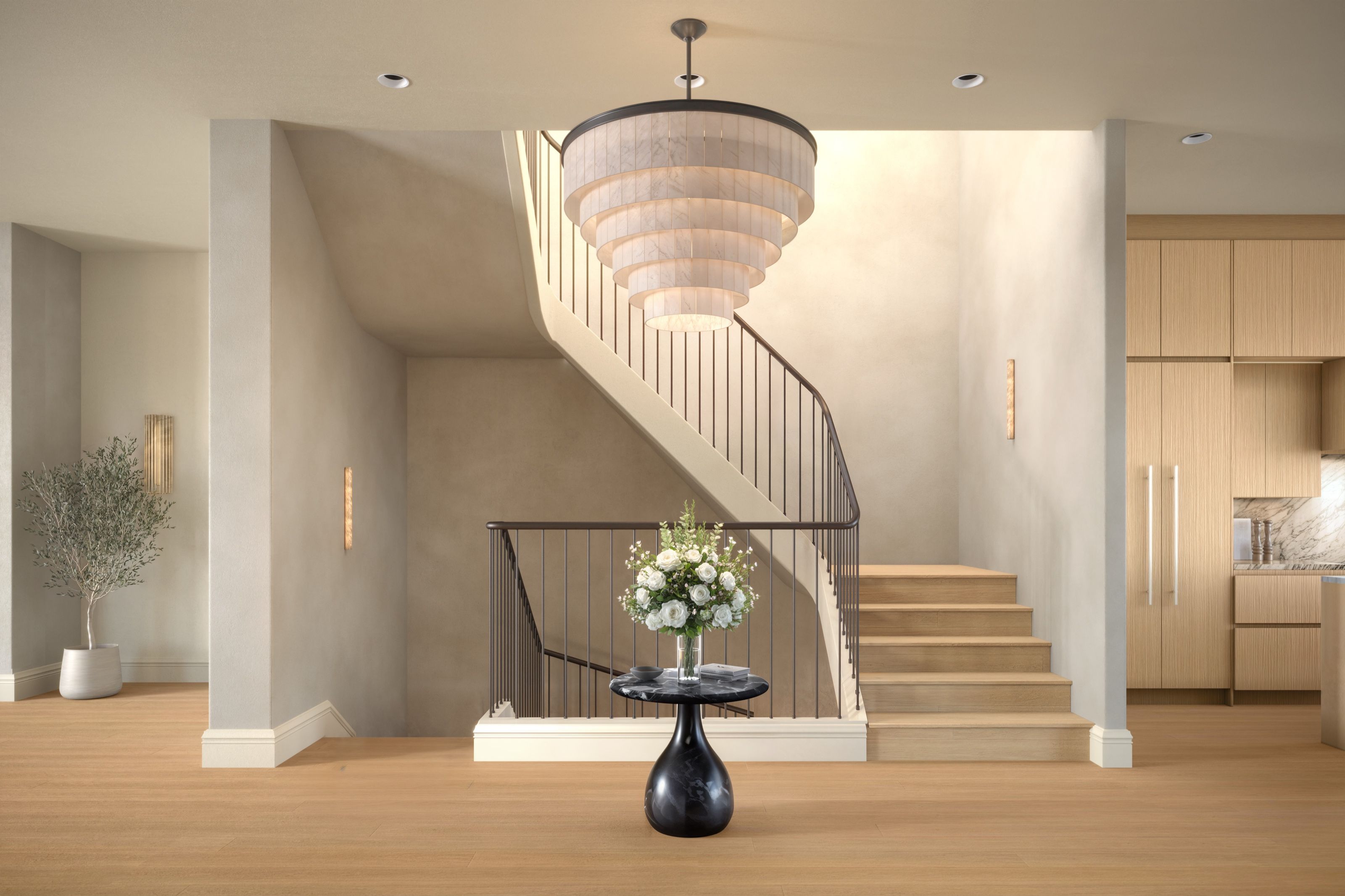 A photorealistic 3D architectural rendering by NoTriangle Studio of the entry foyer and staircase at 3740 Sacramento Street in San Francisco, with a sculptural curved staircase, a tiered drum chandelier, smooth plaster walls, oak floors, and a black pedestal table with white flowers.