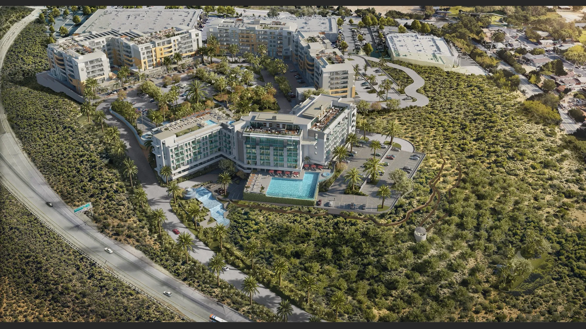 Aerial 3D rendering of The M, a proposed senior-living community on Casey Road in Moorpark, Ventura County, California, its buildings and pool courtyard set among green hillsides