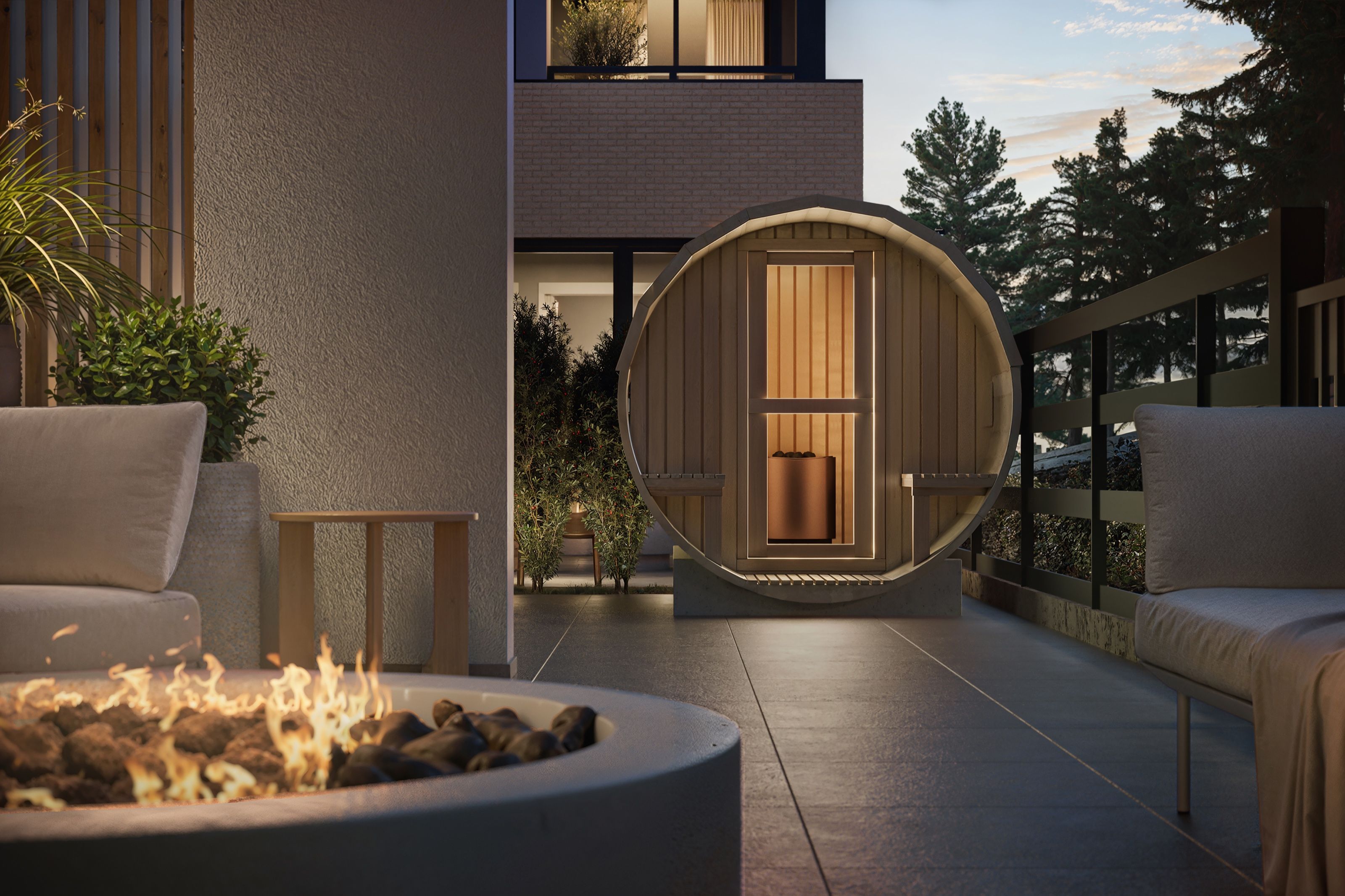 3D rendering of the Muse outdoor wellness terrace at dusk, with a fire table, lounge seating, a cedar barrel sauna, and a backdrop of evergreens.