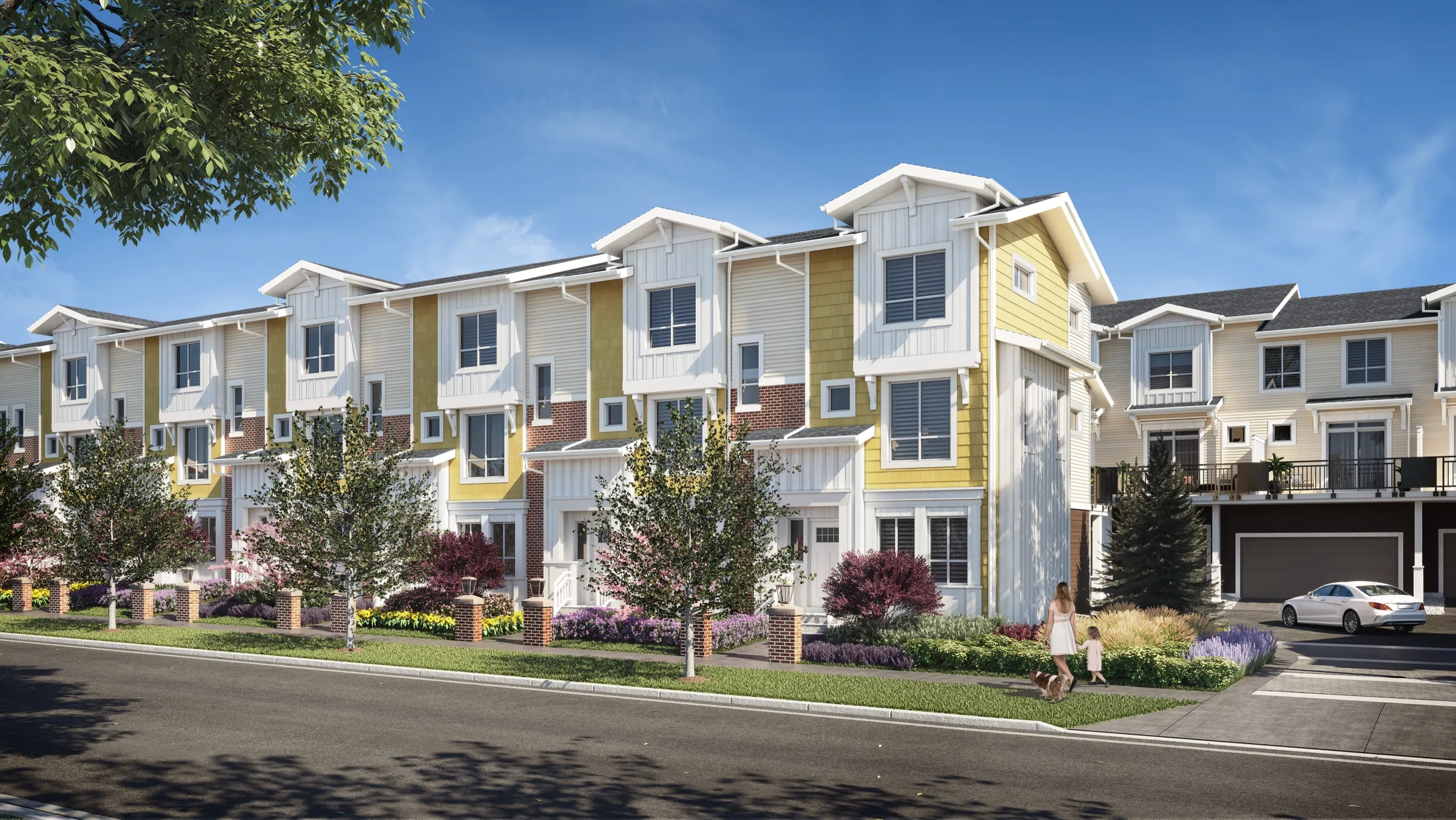 3D exterior rendering by NoTriangle Studio of a street row of townhomes at Hazelwood in South Surrey, BC: three-storey homes in white board-and-batten and yellow siding with brick bases and brick gate posts, flowering front gardens, young street trees, and a mother and child walking a dog along the sidewalk past a driveway with a white car.