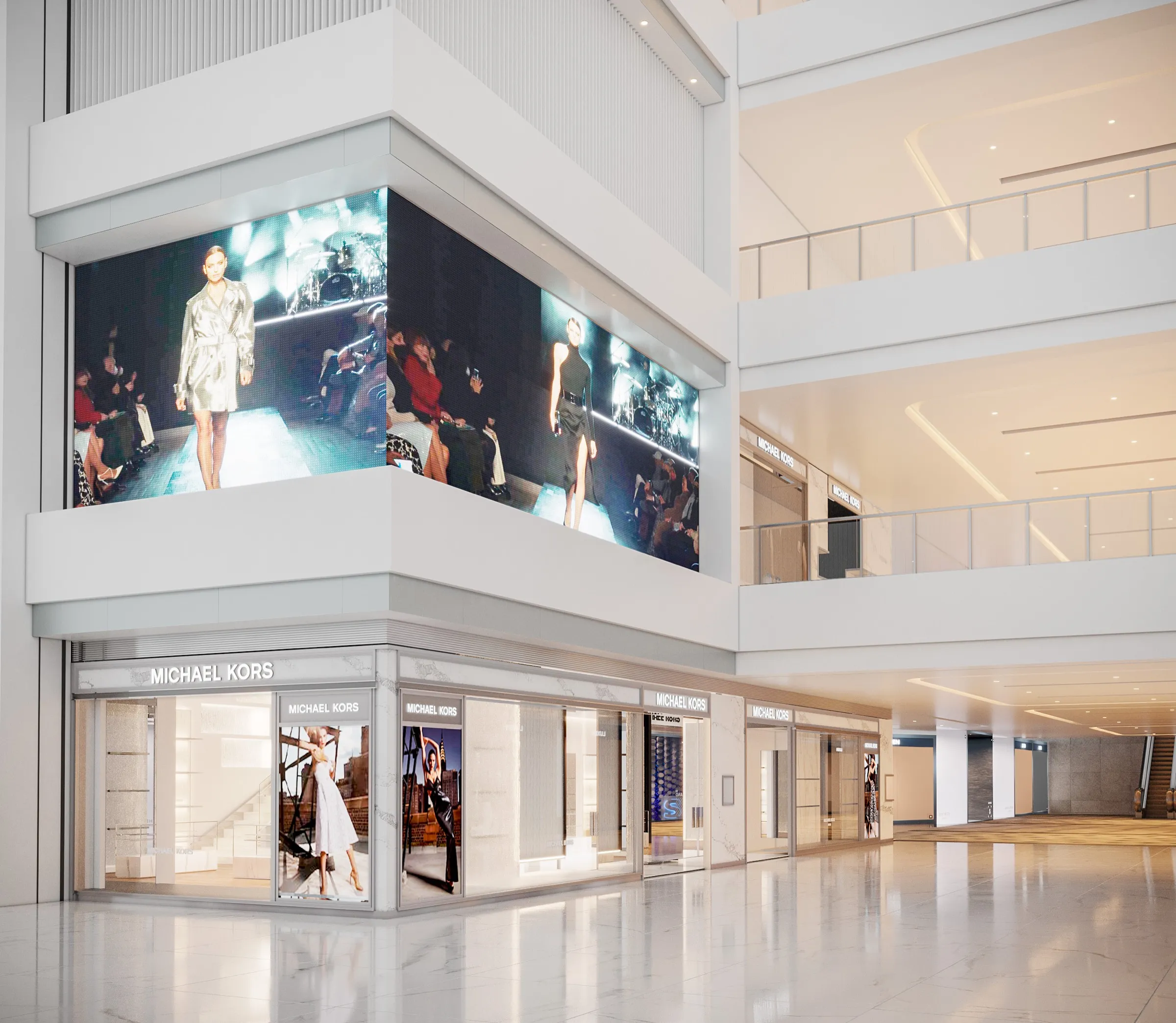 3D rendering of the Michael Kors storefront at Shanghai Kerry Centre, a double-height mall frontage with large fashion campaign screens above the glass shopfront and Michael Kors signage.