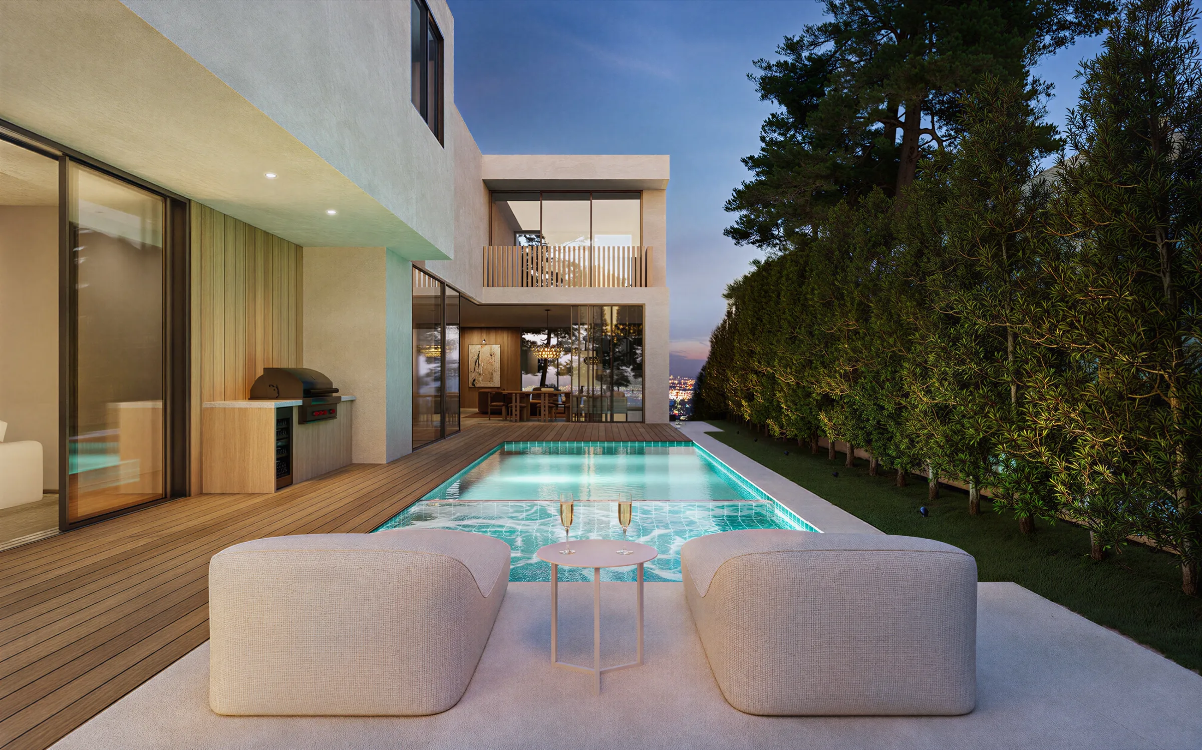 Photorealistic 3D rendering by NoTriangle Studio of the pool terrace of a new house on Mountain View Avenue, Mar Vista, at dusk: two upholstered loungers and a side table on a stone deck, a lit tiled pool, an outdoor kitchen and a tall hedge.