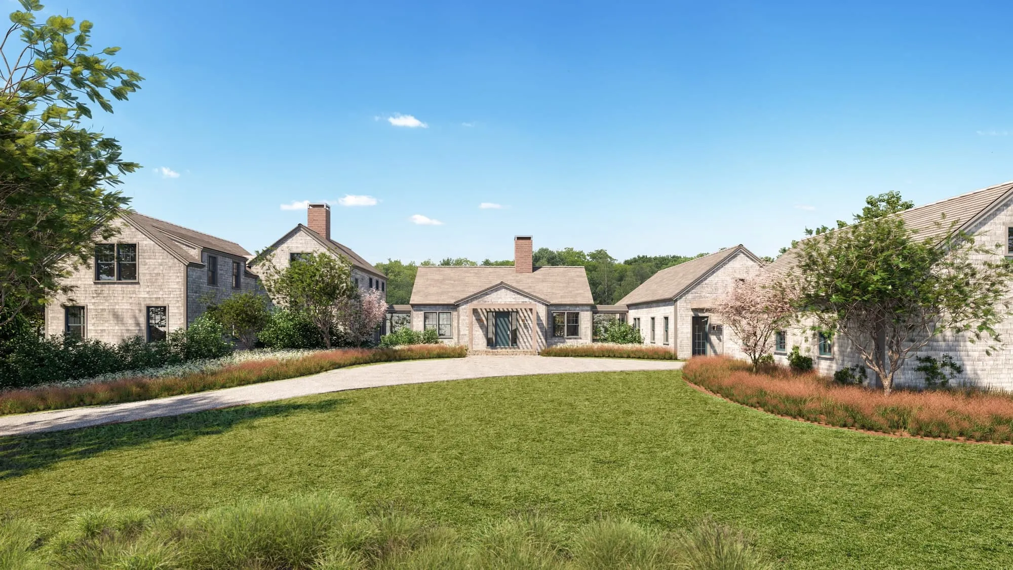 Daytime 3D rendering of the estate's entry motor court, a circular gravel drive and lawn ringed by gray-shingled gabled buildings, with a slatted timber entry porch on the main house and flowering trees.