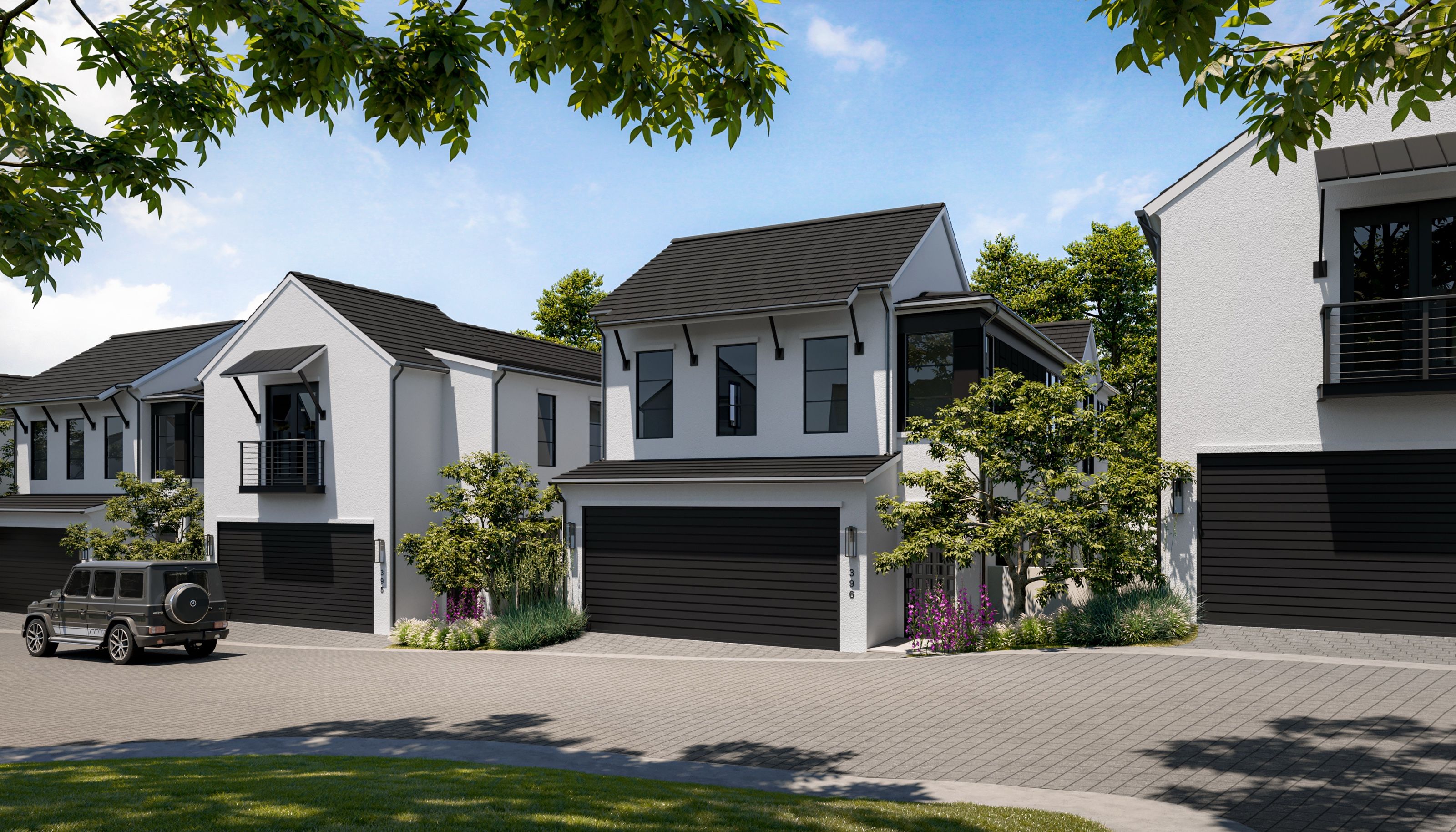 3D exterior rendering of townhomes clustered around a motor court at Addie Westlake in Austin, Texas, with white gabled forms, dark garage doors, and a vehicle in the drive.