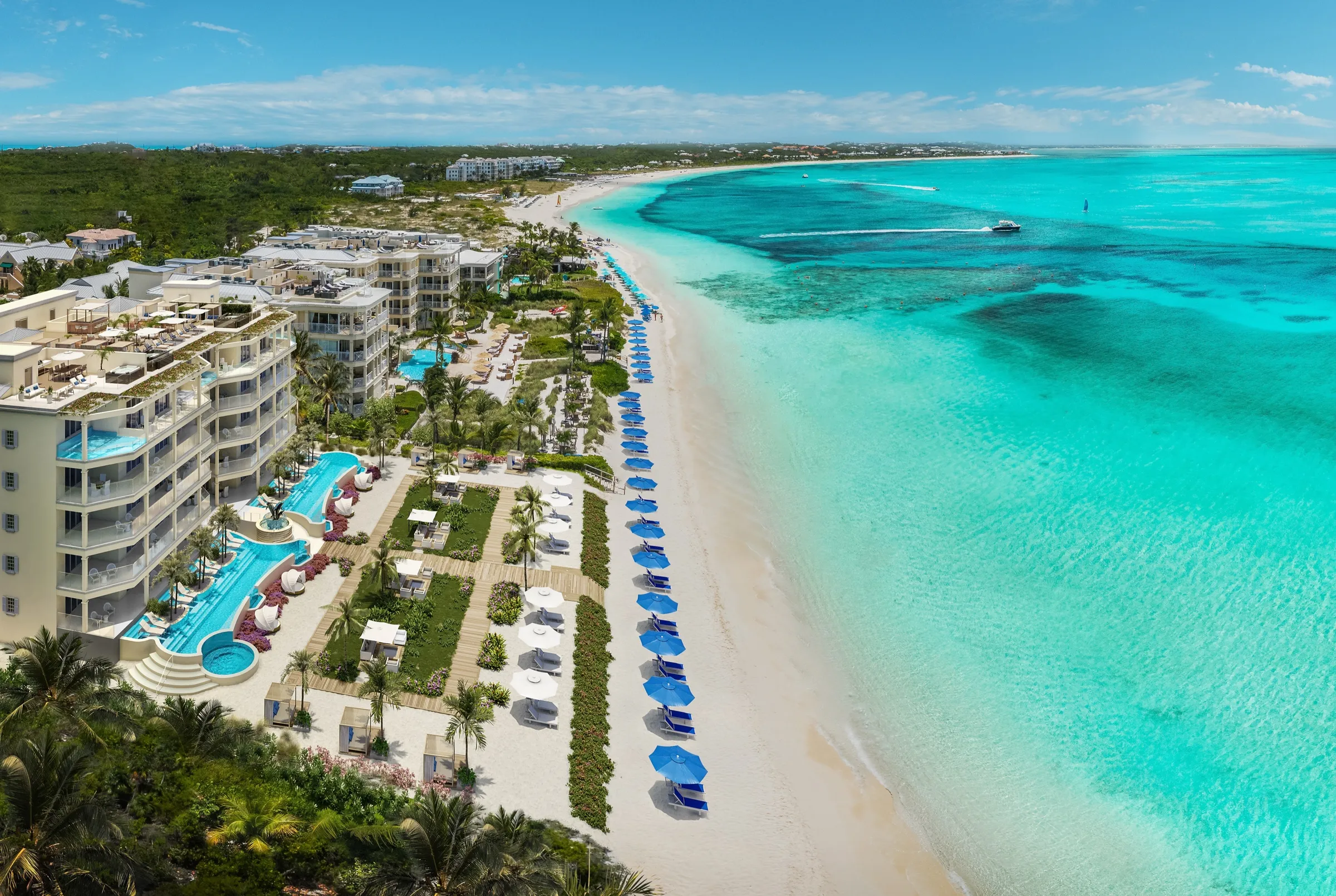 3D aerial rendering of an oceanfront condominium resort in Turks and Caicos, its tiered pools and cabanas stepping down to a white-sand beach and turquoise water