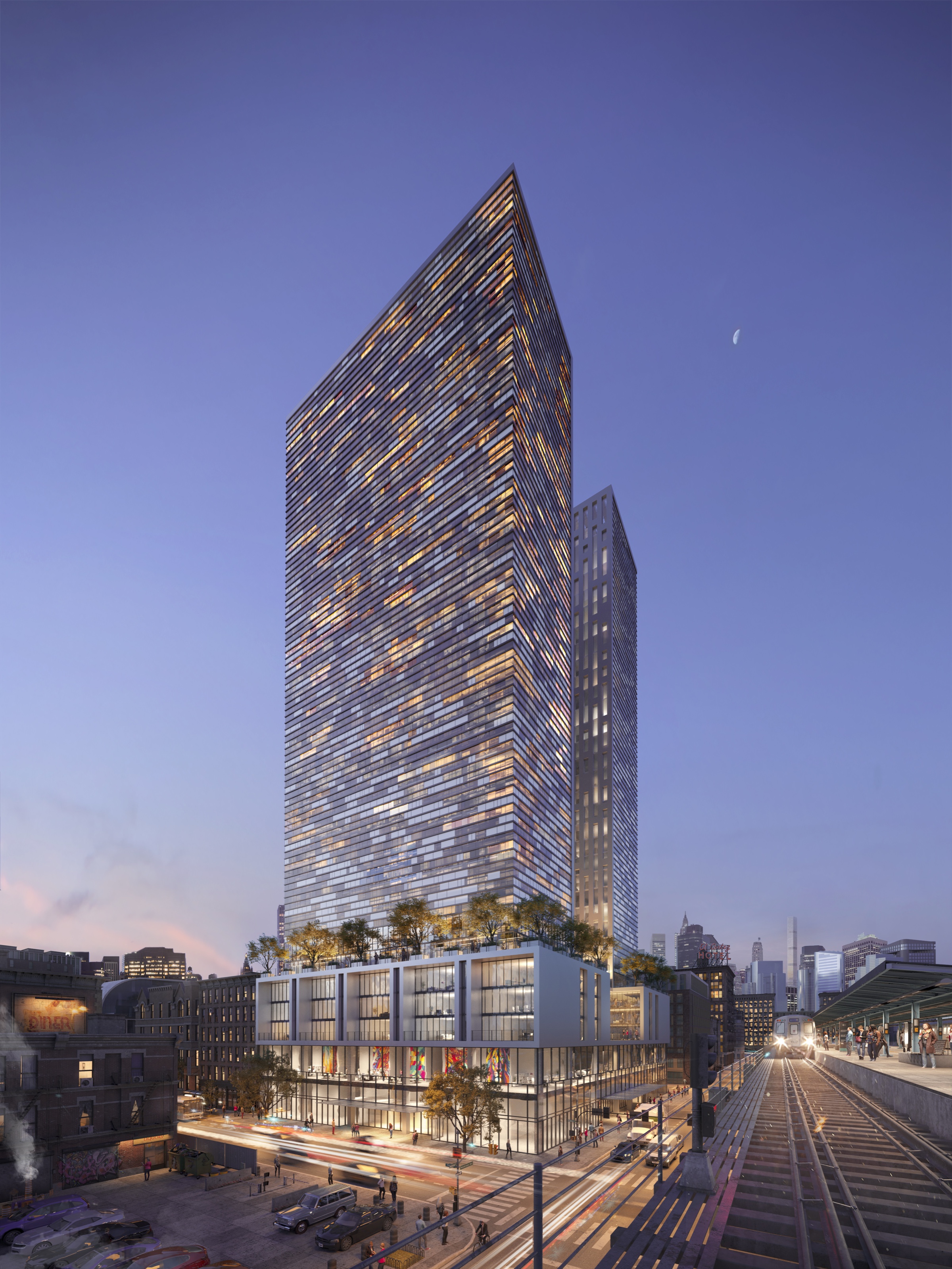 Blue-hour 3D rendering of the 1800 Park Avenue concept towers, warmly lit above the commercial podium, with the Manhattan skyline and the elevated train tracks visible beyond.