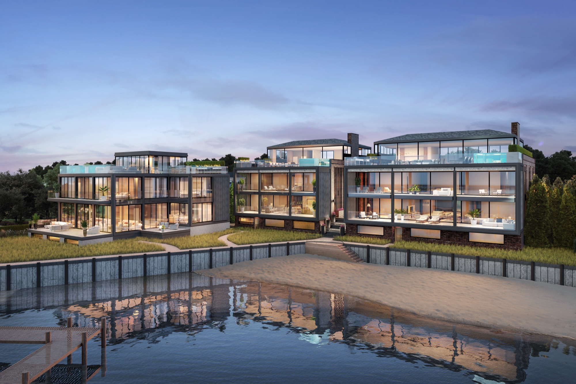 Dusk 3D rendering of the three residences at 2 West Water Street seen from Sag Harbor Cove, their glass facades lit from inside