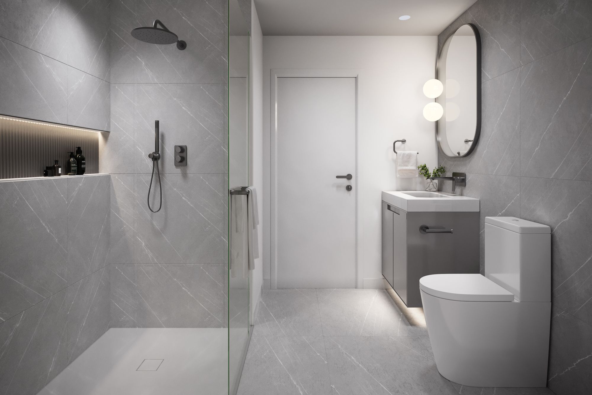 3D interior rendering of a Vivere by Solterra bathroom finished in soft grey stone, with a walk-in glass shower, a wall-hung vanity, an oval mirror, and recessed cove lighting.