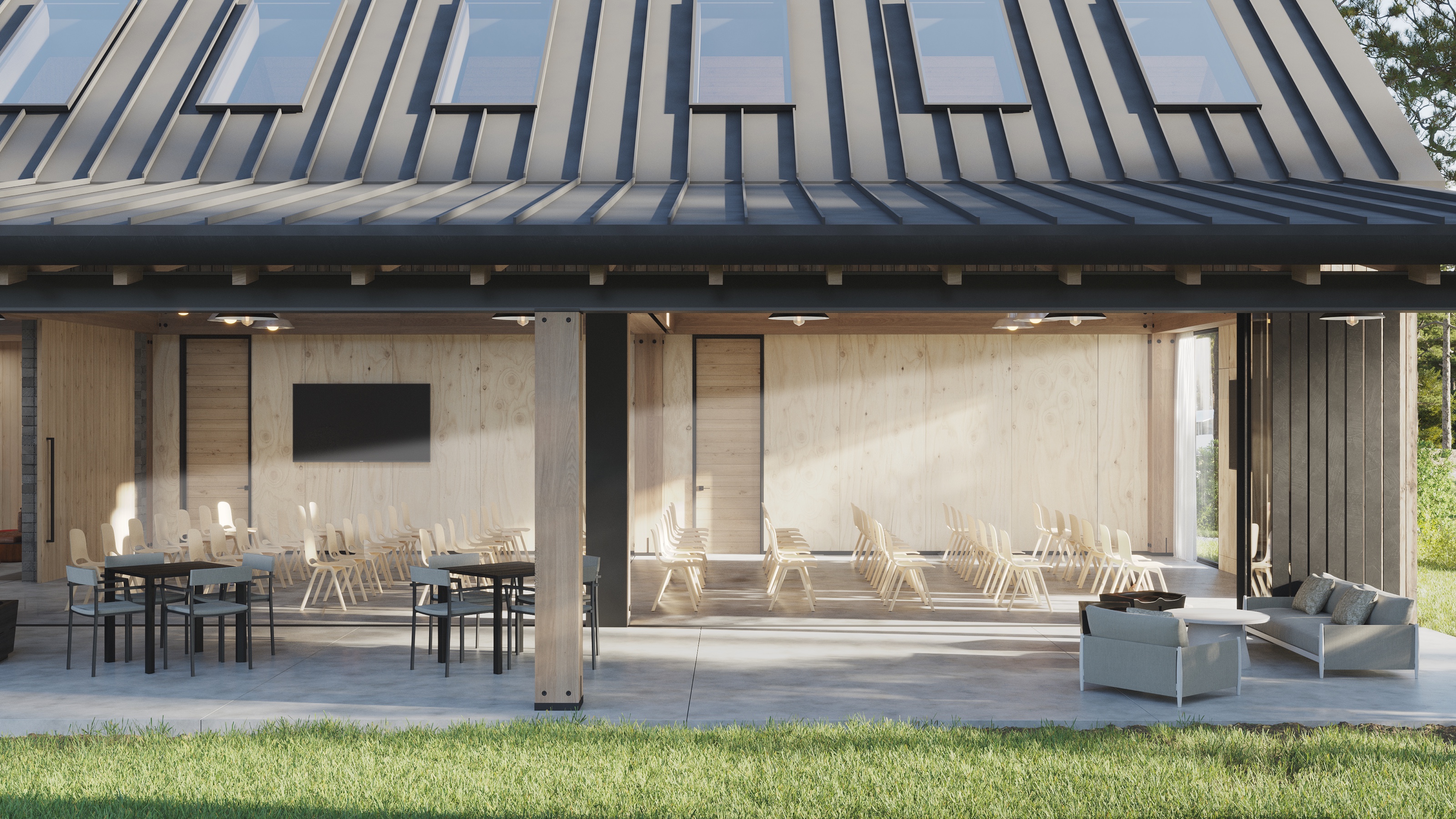 3D rendering of the same AutoCamp Catskills covered porch arranged for a gathering, with rows of chairs facing a wall-mounted screen, dining tables to one side, and a lounge sofa, under the post-and-beam roof.