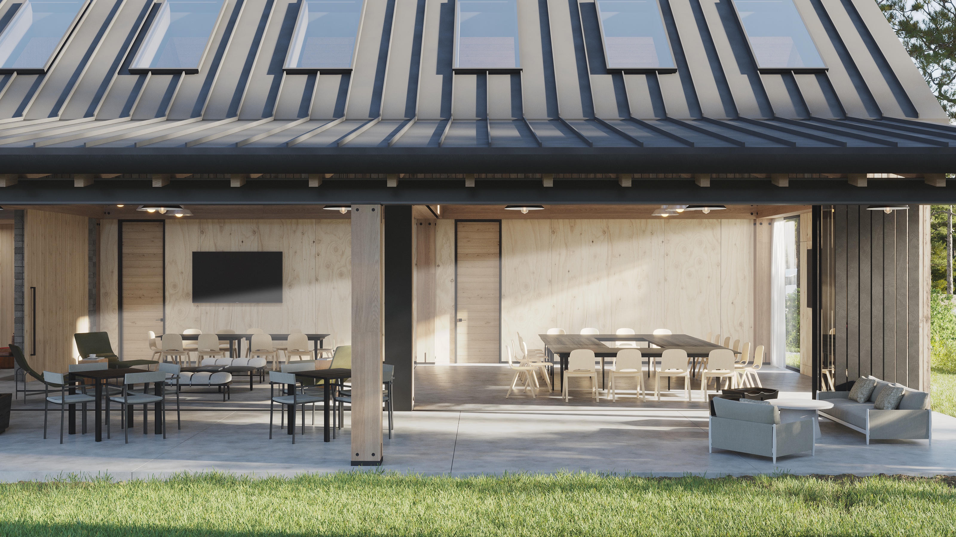 3D rendering of the AutoCamp Catskills covered porch set for dining, with post-and-beam columns under a deep standing-seam roof, dining tables and chairs, a wall-mounted screen, and a lounge sofa on the concrete patio.
