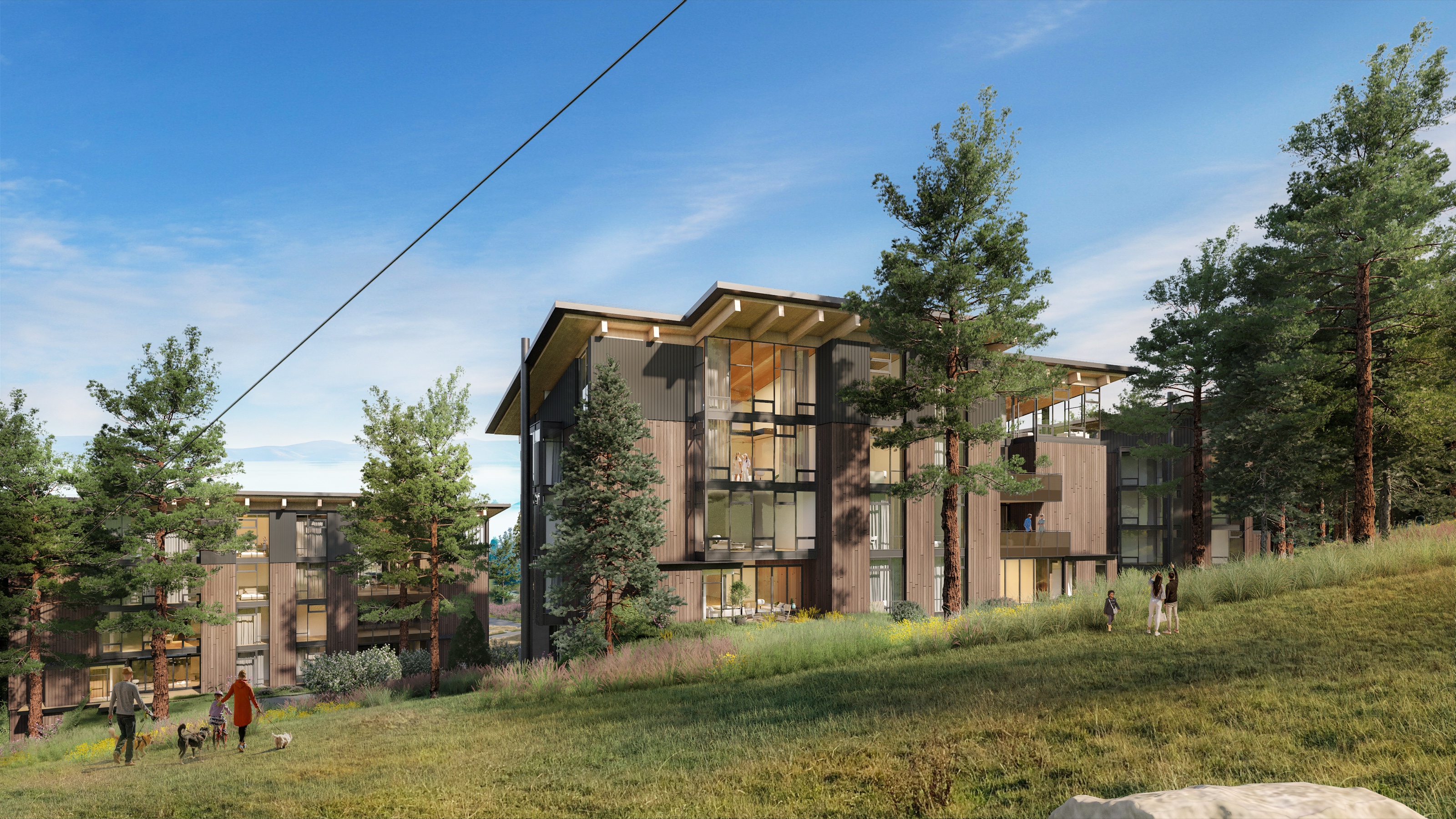 Eye-level summer 3D rendering of the Homewood North Base residences seen from a grassy slope, with families walking dogs on a path, mountain-modern wood-and-glass buildings stepping up the hillside, and pines framing the view