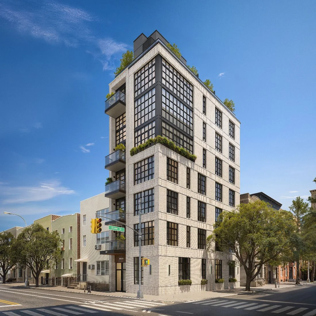 3D rendering of modern townhouse building at 402 Union Avenue in Williamsburg Brooklyn featuring brick façade, balconies, and corner street view