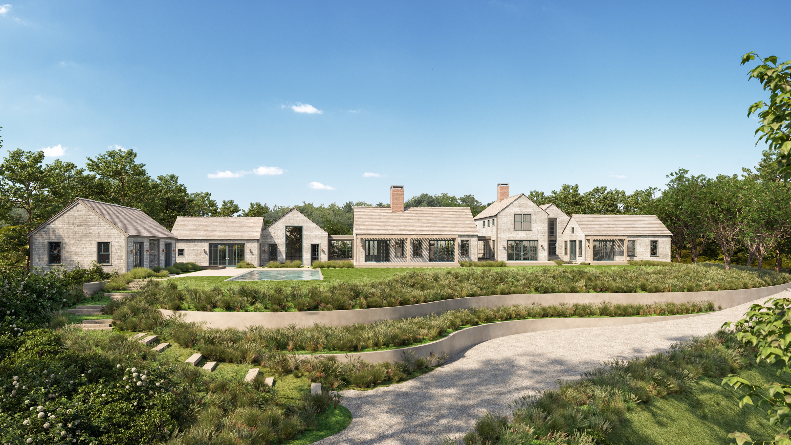 Daytime 3D rendering of the estate compound from the gravel drive, gabled shingle volumes and stone chimneys above terraced plantings held by pale parged-concrete retaining walls, with the pool at left.