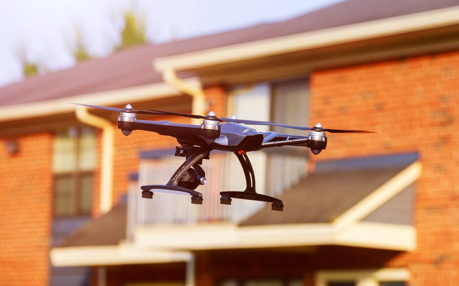 Real Estate Drone Photography Guide Person Flying Drone