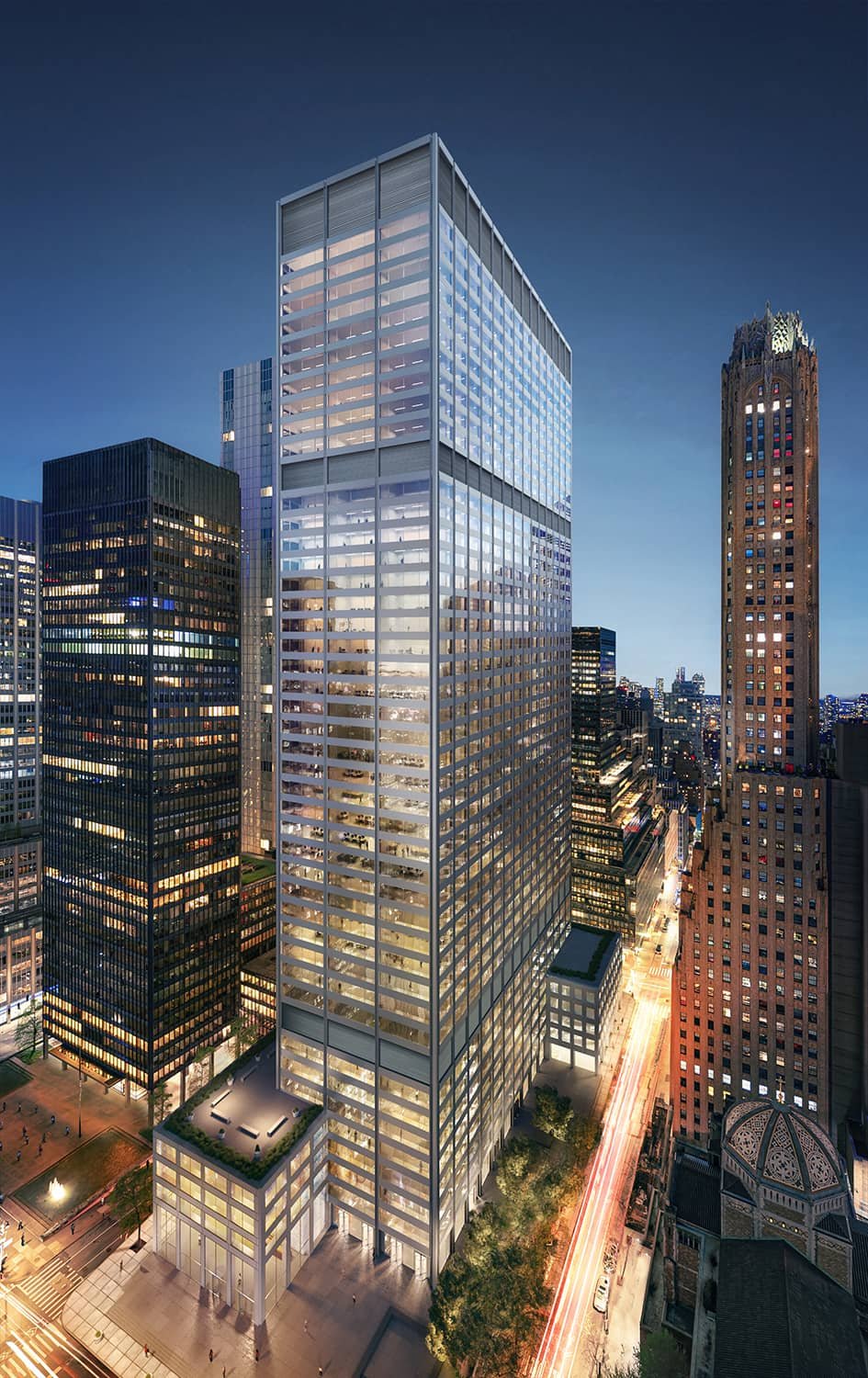 exterior rendering of a tall building in a city at night